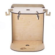 The Small Hobby Horse Stable by Hobby Horse LarDen is a wooden, flat-pack stand with interlocking tabs, cutouts, and a laser-etched LarDen logo—ideal for displaying your favorite plywood hobby horse.