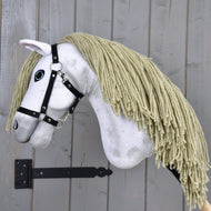 The Hobby Horse Victory with Black Halter (size M) by Hobby Horse LarDen features a white plush head, long yellow yarn mane, and black halter, inspired by an Andalusian mare.