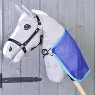 A gray Hobby Horse LarDen toy with a black bridle and white mane wears a blue Fly sheet cape. The horse features cartoon-like eyes and is mounted against a wooden wall.