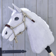 The Hobby Horse LarDen "Rope halter Nature" is a gray stick hobby horse with a white mane and rope halter, mounted on a wooden pole—perfect for imaginative play.