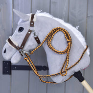 The Set Perfect Combination Brown by Hobby Horse LarDen is a charming brown hobby horse with a soft mane, bridle, and comfy fur-padded halter on a wooden stick—an adorable addition to your Hobby Horse accessories collection.
