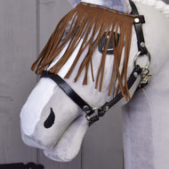 A close-up of a gray and white plush toy horse wearing the Hobby Horse LarDen Halter black with brown fringes, set against a wooden background.