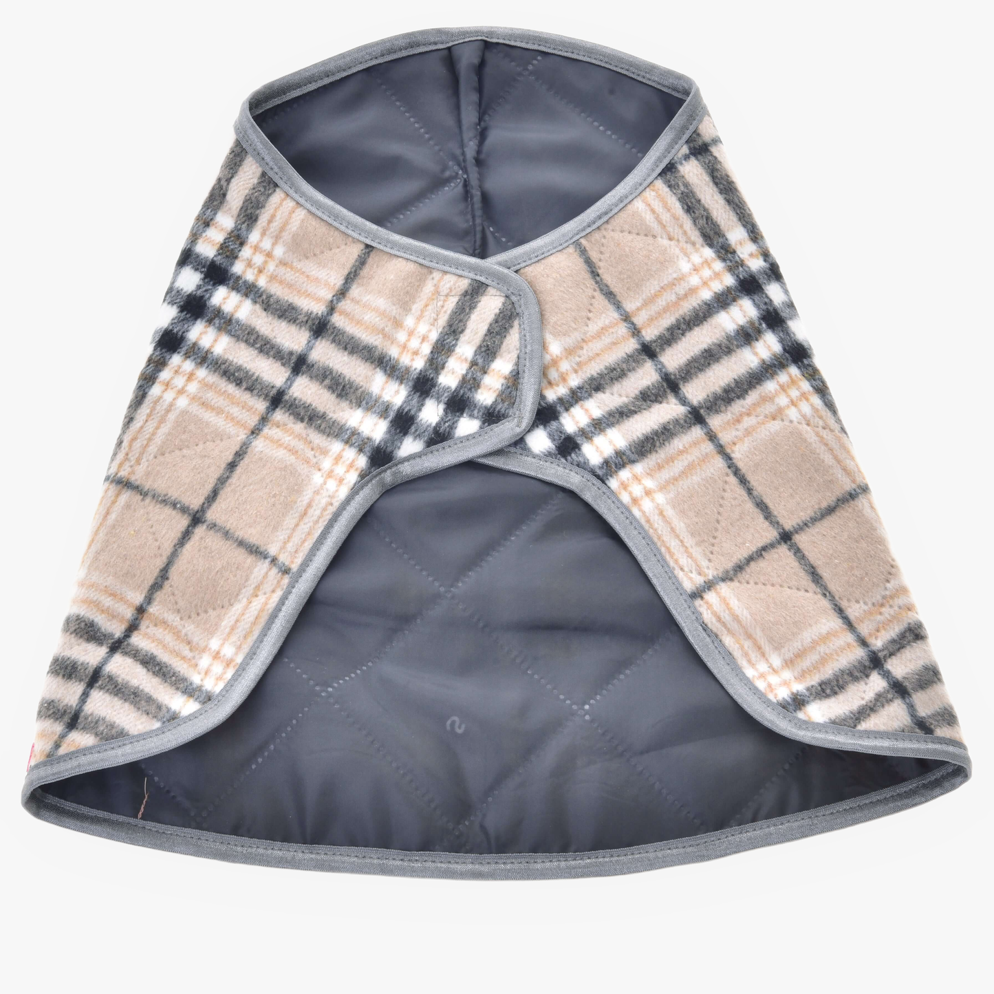 The Blanket Cremo England by Hobby Horse LarDen is a stylish small quilted plaid dog coat in beige, black, and white checks with gray trim and a wrap-around design—ideal for pairing with an ear bonnet for added insect protection. Laid flat on white background.