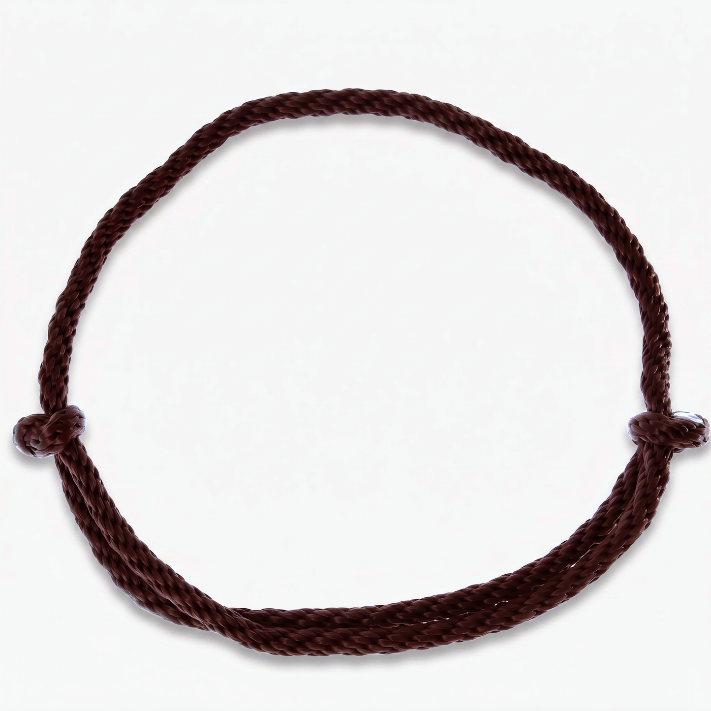The Cordeo Chocolate by Hobby Horse LarDen is a simple, dark polypropylene rope tied in a circle with two knots on opposite sides, shown against a plain white background.